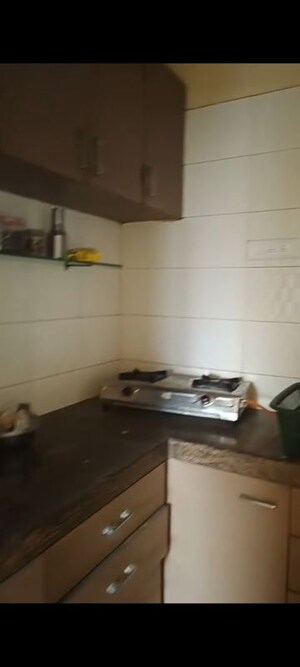 Kitchen in 2 BHK Apartment at Yashraj Park CHS, Kasarvadavali – for Rent