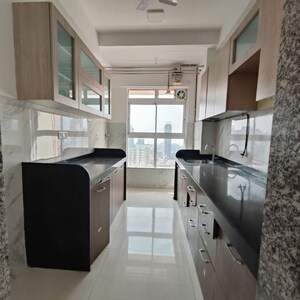 Kitchen in 2 BHK Apartment at Nirvana CHS, New Dinkar Housing Cooperative Society – for Rent