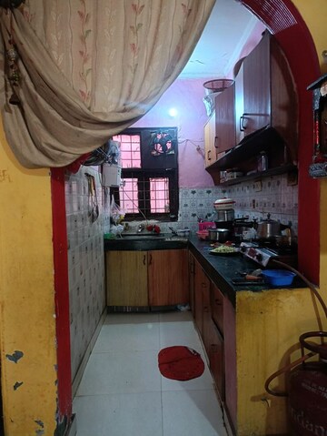 Kitchen in 2 BHK Builder Floor at Laxman Vihar Phase 2 – for Sale