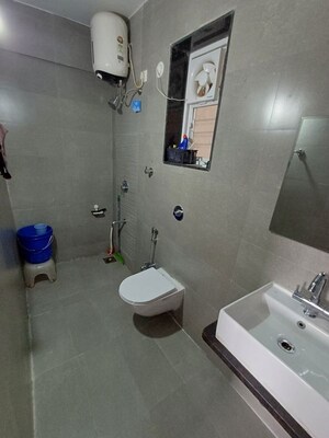 Bathroom in 3 BHK Apartment at Ranade Yashodhan, Mayur Colony – for Rent