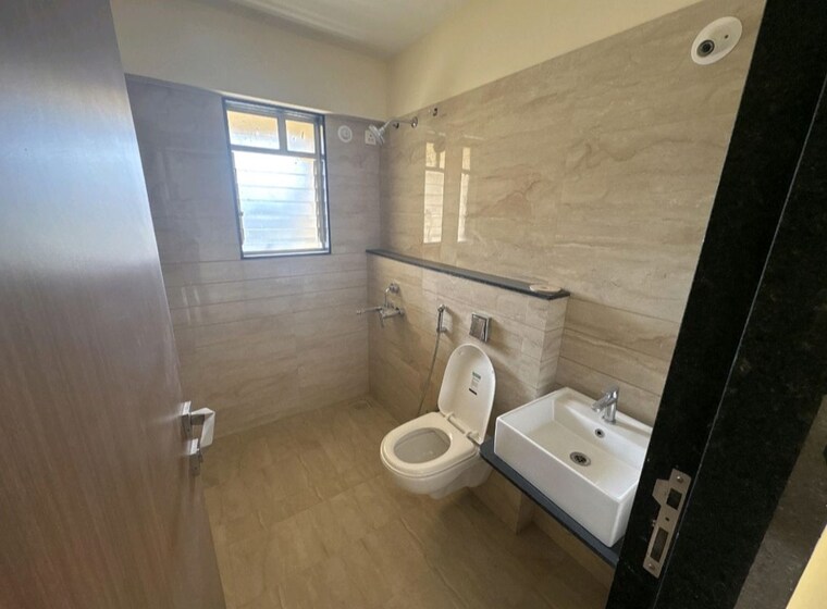 Bathroom, vertical-alcinia 2 Bedroom 767 Sq.Ft. Apartment In Mohammadwadi Pune 10043454