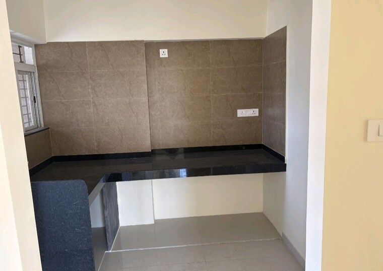 Kitchen, vertical-alcinia 2 Bedroom 767 Sq.Ft. Apartment In Mohammadwadi Pune 10043454
