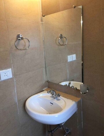 Bathroom in 1 BHK Apartment at Paras Tierea, Sector 137 – for Rent