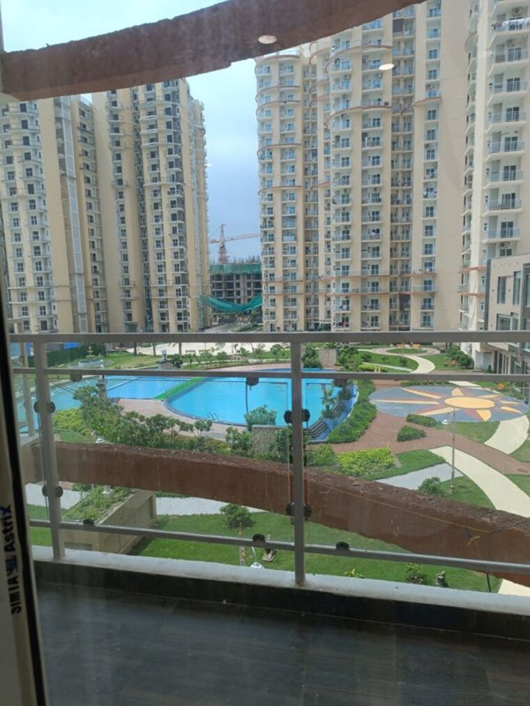 Swimming Pool, samridhi-daksh-avenue 2.5 Bedroom 1350 Sq.Ft. Apartment In Sector 150 Noida 10043465