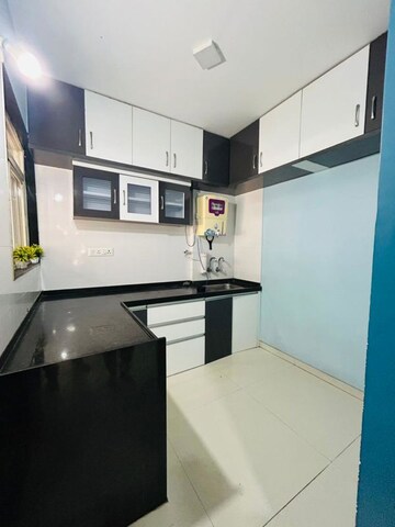 Kitchen in 2 BHK Apartment at Triaa Hillome, Lohgaon – for Rent