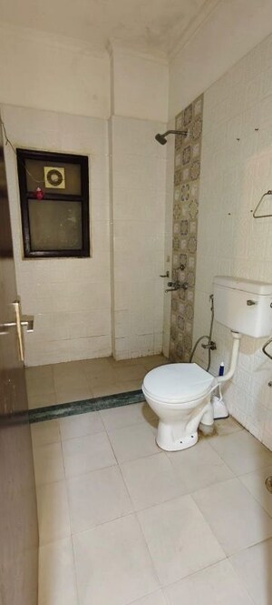 Bathroom in 1 BHK Builder Floor at Ansal Sushant Lok I, Sector 43 – for Rent