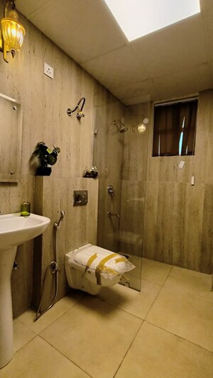 Bathroom in 3 BHK Apartment at Motia Harmony Greens, Kishanpura – for Sale