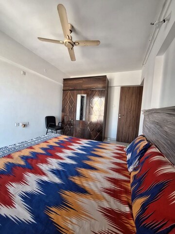 Bedroom in 3 BHK Apartment at Pride World City Kingsbury, Charholi Budruk – for Rent