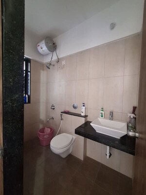 Bathroom in 3 BHK Apartment at Pride World City Kingsbury, Charholi Budruk – for Rent