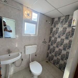 Bathroom in 2 BHK Apartment at Signature The Millennia 3, Sector 37d – for Rent