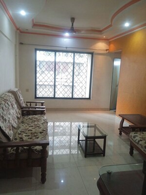 Living Room in 1 BHK Apartment at Satellite Garden, Goregaon East – for Rent