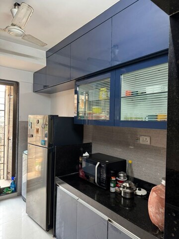 Kitchen in 2 BHK Apartment at Acme Avenue, Kandivali West – for Sale