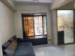 Living Room in 2 BHK Apartment at Bhanushanti Apartment, Goregaon East – for Rent