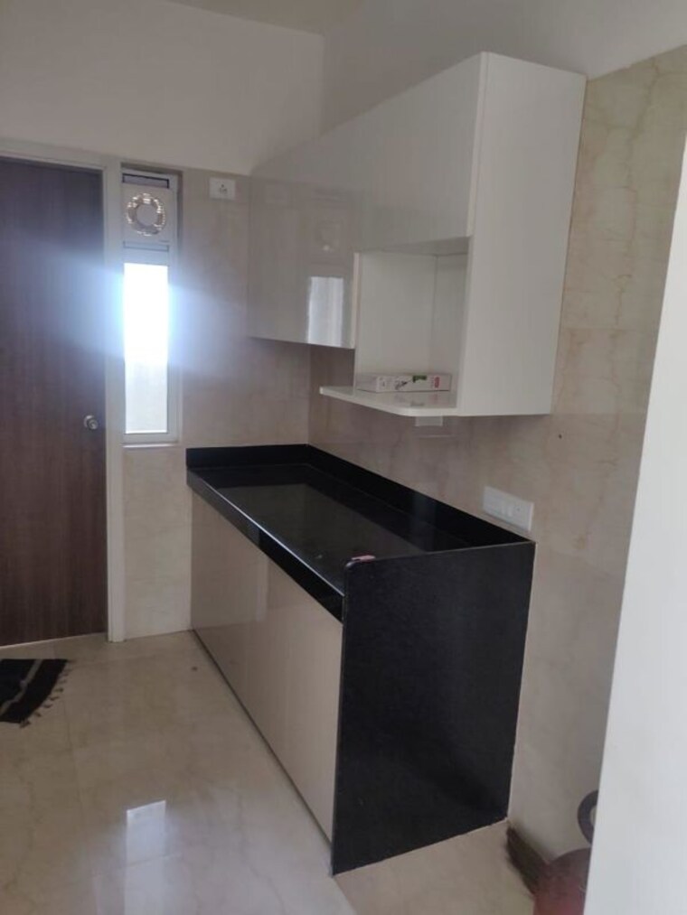 Kitchen, l-t-crescent-bay-t2 2 Bedroom 800 Sq.Ft. Apartment In Parel Mumbai 10043835