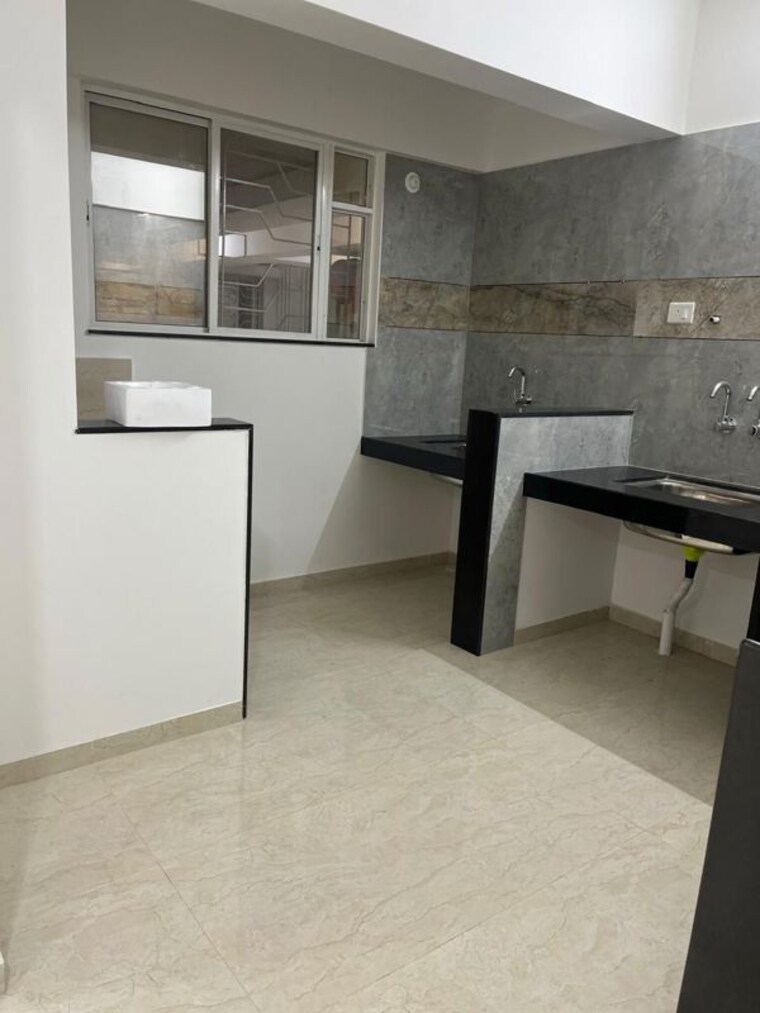 Kitchen, wakad 2 Bedroom 809 Sq.Ft. Apartment In Wakad Pune 10043903