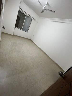 Room in 2 BHK Apartment at Wakad – for Sale