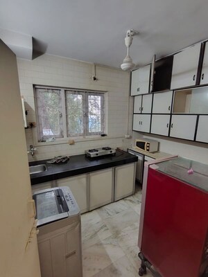 Kitchen in 2 BHK Apartment at Kailash Niketan, Altamount Road – for Rent