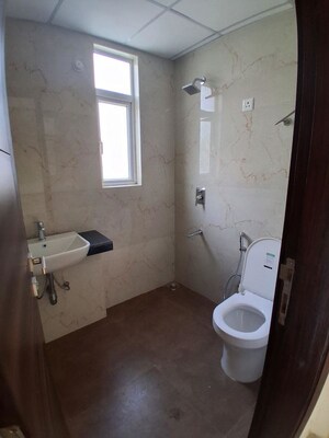 Bathroom in 2.5 BHK Apartment at Smart World Gems, Sector 89 – for Sale