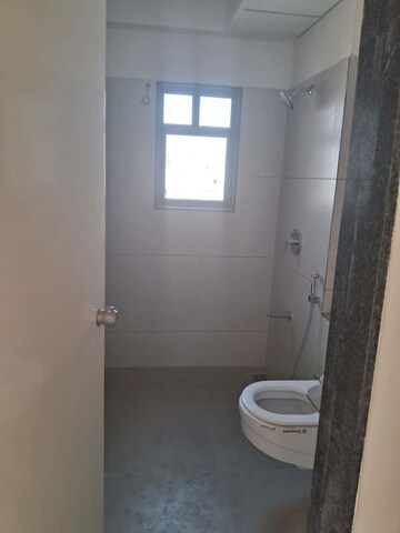 Bathroom in 3 BHK Apartment at Excellife Vivekanand Arise, Satellite – for Rent