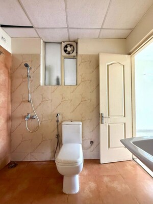 Bathroom in 3 BHK Apartment at Sushma Elite Cross, Dhakoli – for Rent