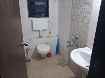 Bathroom in 2 BHK Apartment at Runwal Pearl, Manpada – for Rent