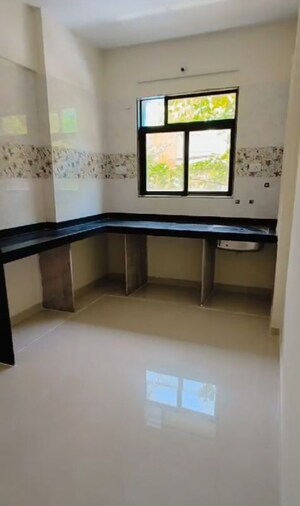Kitchen in 1 BHK Apartment at Raj Tulsi City, Badlapur East – for Sale