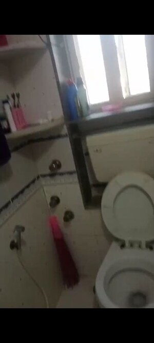 Bathroom in 2 BHK Apartment at Takshila CHS, Andheri East – for Rent