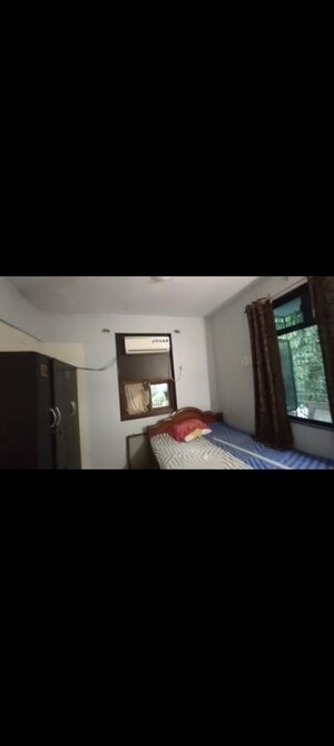 Bedroom in 2 BHK Apartment at Takshila CHS, Andheri East – for Rent