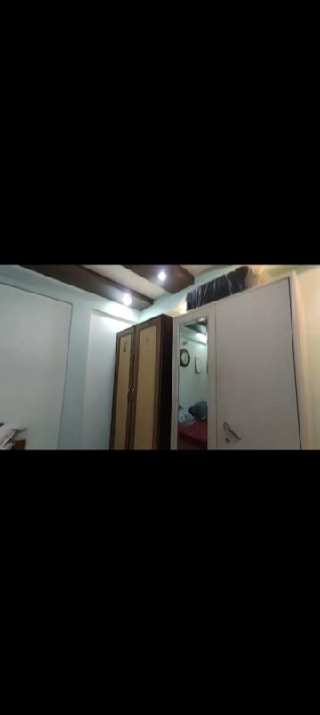 Bedroom in 2 BHK Apartment at Takshila CHS, Andheri East – for Rent