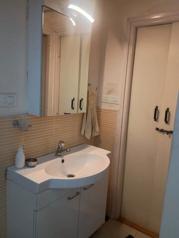 Bathroom in 2 BHK Builder Floor at Nirman Nisarga, Bhusari Colony – for Sale