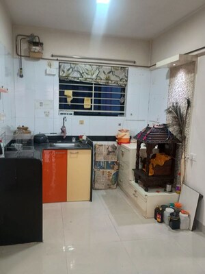 Kitchen in 2 BHK Builder Floor at Nirman Nisarga, Bhusari Colony – for Sale