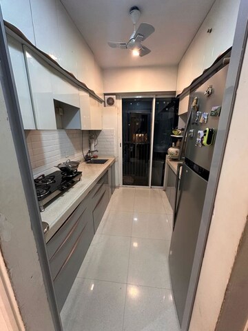 Kitchen in 2 BHK Apartment at Courtyard by Narang Realty and The Wadhwa Group, Pokhran Road No Two – for Rent