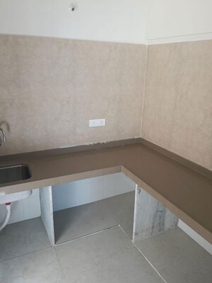 Kitchen in 2 BHK Apartment at Dosti West County, Balkum Pada – for Rent