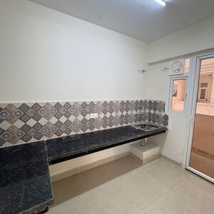 Kitchen in 2 BHK Apartment at Signature The Millennia 3, Sector 37d – for Rent