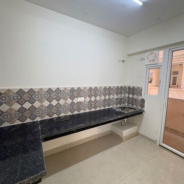 Kitchen in 2 BHK Apartment at Signature The Millennia 3, Sector 37d – for Rent