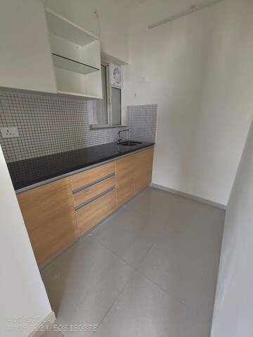 Kitchen in 2 BHK Apartment at Omkar Signet, Malad East – for Rent