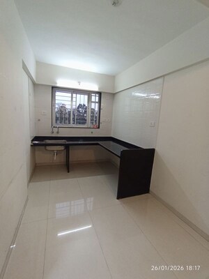 Kitchen in 2 BHK Apartment at Shanti Sentosa Serene, Tathawade – for Rent