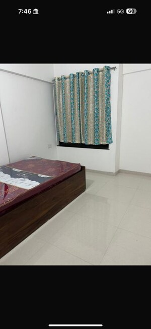 Bedroom in 2 BHK Apartment at Roshan Milestone, Tathawade – for Rent
