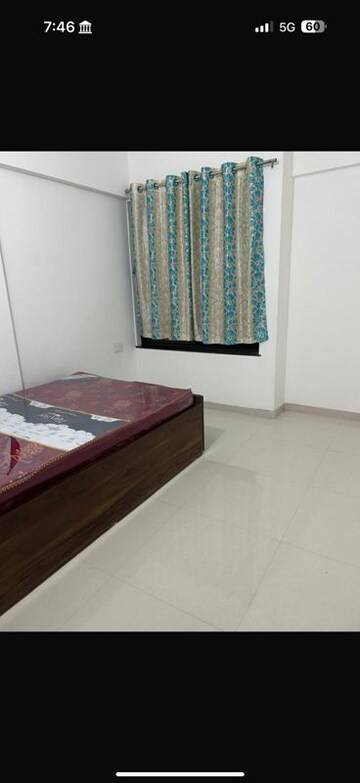 Bedroom in 2 BHK Apartment at Roshan Milestone, Tathawade – for Rent