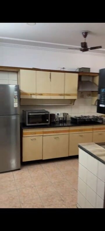 Kitchen in 4 BHK Apartment at Vaibhav Khand – for Sale