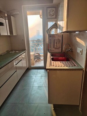 Kitchen in 2.5 BHK Apartment at Smart World Gems, Sector 89 – for Rent