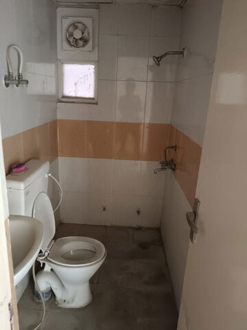 Bathroom in 2 BHK Apartment at Raj Nagar Extension – for Sale