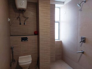 Bathroom in 4 BHK Apartment at Suraj Oranje Castle, Gomti Nagar – for Rent