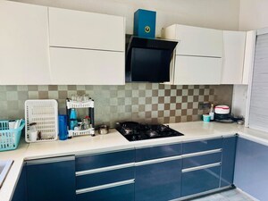 Kitchen in 3.5 BHK Apartment at Orchid Petals, Sector 49 – for Rent