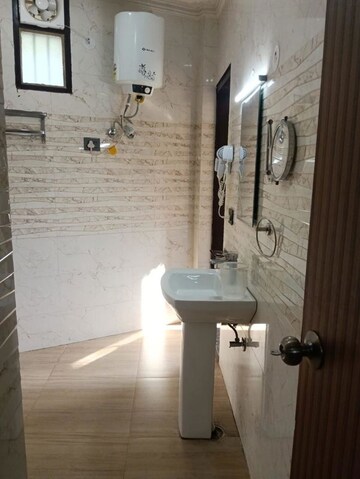 Bathroom in 3 BHK Builder Floor at Hong Kong Bazaar, Sector 57 – for Rent
