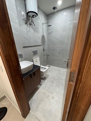 Bathroom in 1 BHK Builder Floor at Ansal Royale Casa, Sector 55 – for Rent