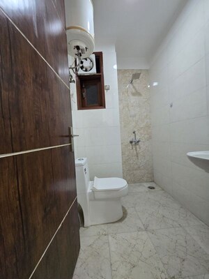 Bathroom in 2 BHK Apartment at Palm Residency Chhatarpur, Rajpur Khurd Extension – for Rent