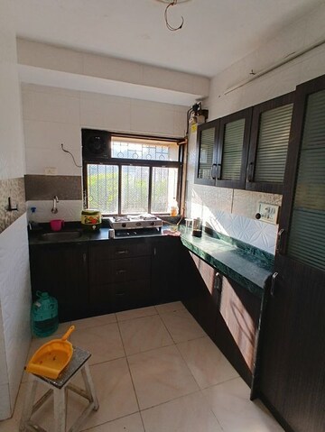 Kitchen in 1 BHK Apartment at Millennium Tower, Kandivali East – for Rent