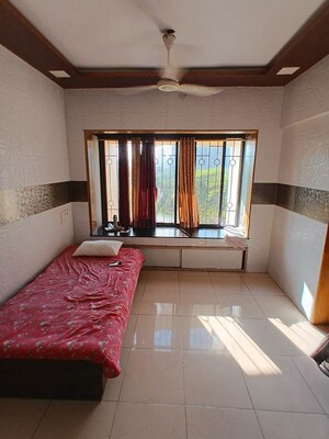 Bedroom in 1 BHK Apartment at Millennium Tower, Kandivali East – for Rent