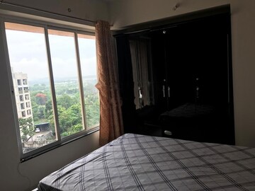 Bedroom in 2 BHK Apartment at Puranik City, Kasarvadavali – for Rent